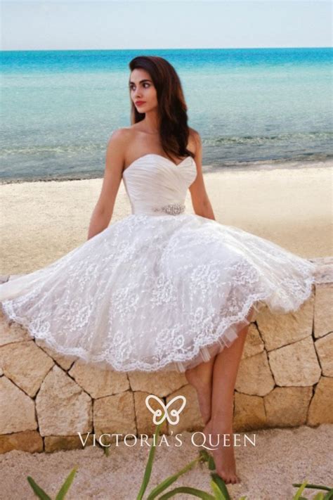 Whether they're cropped just above the ankles or cut to a daring cocktail length, short dresses are appearing on aisles everywhere. Strapless Sweetheart Satin and Lace Short Wedding Dress - VQ