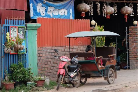 Little Asian Girl Sits In A Moto Rickshaw Near A House With Red Lanterns Editorial Stock Image