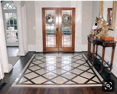 Like Entry Wood And Tile Floor Tile Design Floor Design Foyer Design