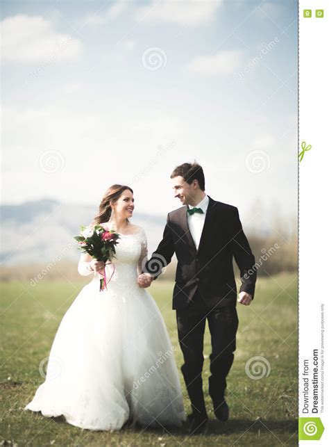 Beautiful Wedding Couple Bride Groom Posing And Walking