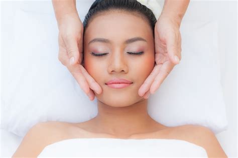 Premium Photo Beautiful Young Woman Receiving Massage In Spa Salon