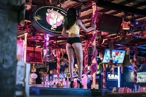 A Cute Thai Asian Girl Dances A Striptease On A Pole Night Club In