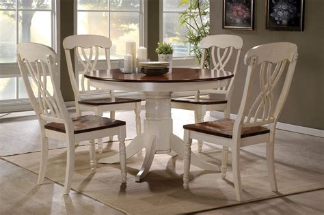 A standard kitchen table is approx 30 high and is available in many shapes including round, square, oval and rectangular. 42 Lander Oak Buttermilk Round Kitchen Table Set | Table for 4