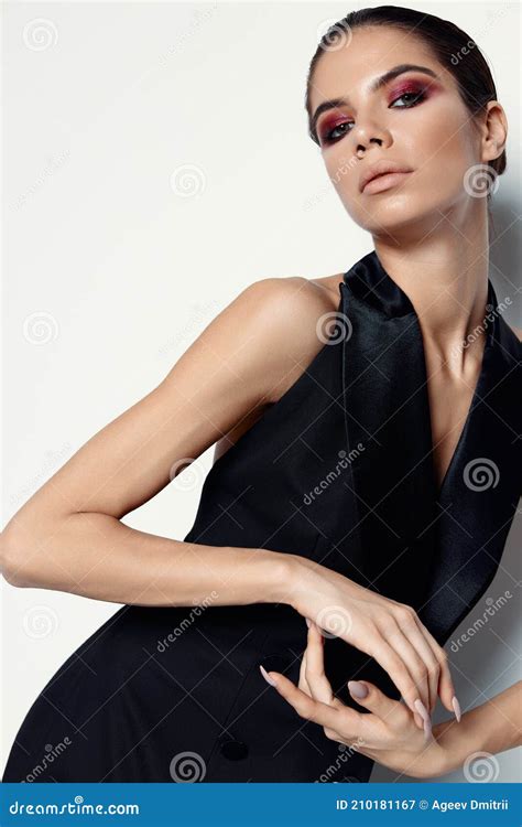 Luxurious Woman In Black Dress Evening Make Up Eye Shadows Naked