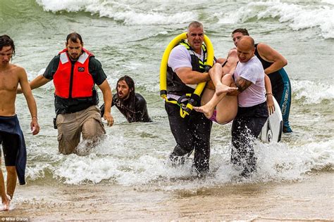 Lake Michigan Surfer Saves Two Teen Girls After Being Caught In A