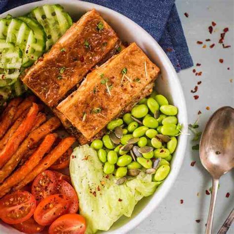 A healthy lunch or dinner, perfect for the new year! Peanut Butter Baked Tofu Buddha Bowl Recipe - Easy and ...