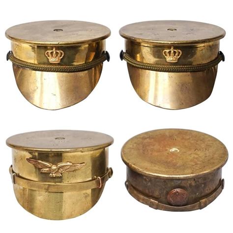 Collection Of Four Brass Trench Art Military Caps Or Kepis Wwi