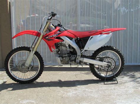 Bike has been displayed in my clean/smoke free living room since purchased. 2005 Honda Crf 450R Dirt Bike for sale on 2040-motos