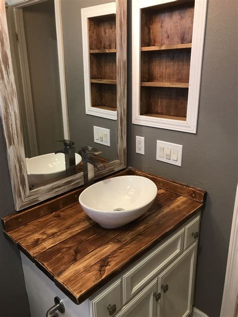 Vessel sinks feature unusual but people with modern homes love them a lot. Diy Rustic wood countertop and vessel sink. Bathroom ...