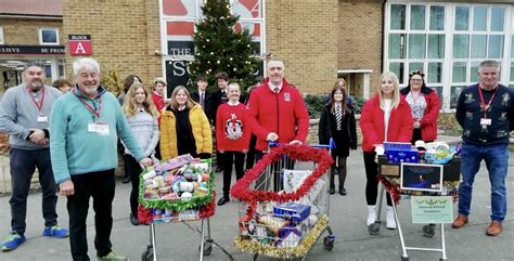 Students Present Foodbank With Donations From Their Christmas Reverse