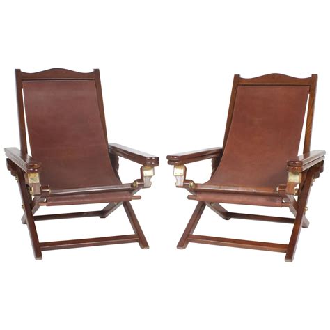 These chairs are easy to clean with general household products. Exceptional Pair of Campaign Style Folding Chairs For Sale ...
