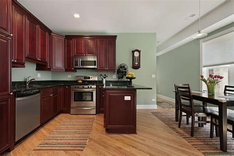 Light Sage Green Paint Colors In Kitchen With Dark Mahogany Cabinets