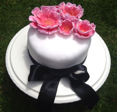 Tarzan cake design images (tarzan birthday cake ideas). Simple peony flowers Anniversary cake | Simple anniversary ...