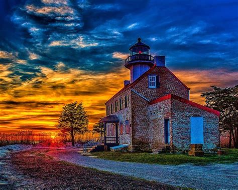Sunset At East Point Lighthouse By Nick Zelinsky Lighthouse