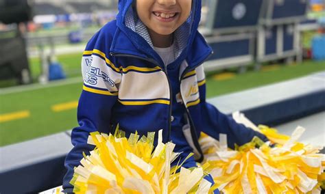 8 year old girl battling cancer becomes honorary rams cheerleader nbc los angeles