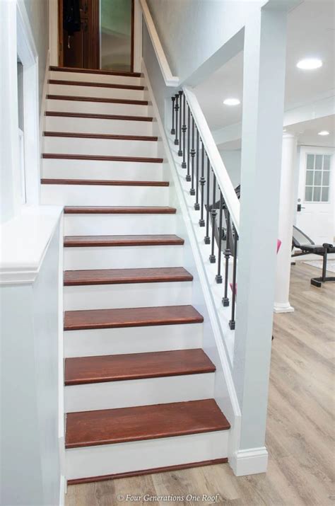 Why We Opened Up Our Basement Staircase And Installed Iron Balusters