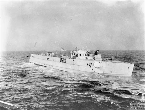 A GERMAN E-BOAT CAPTURED BY A BRITISH COASTAL CRAFT AFTER AN ENGAGEMENT ...