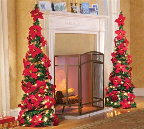 Have you ever considered using cut flower poinsettias in your christmas flower arrangements or as stand alone flowers? Poinsettia Trees and Bush Decorations | Christmas Wikii