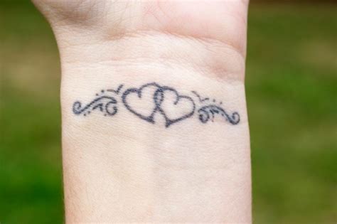 These are too small to be tattooed to look right in a couple of years. 69 Attractive Wrist Tattoo Designs - Mens Craze