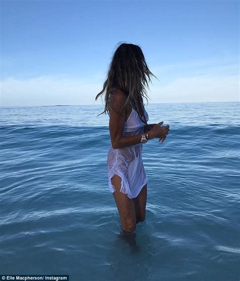 Elle Macpherson Forgoes Bikini Bottoms For Racy Swim Daily Mail Online