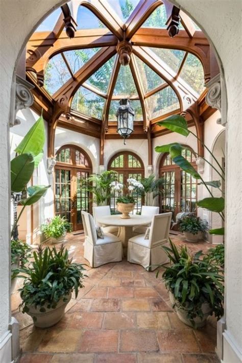 9 Beautiful Sun Rooms Youll Love Town And Country Living Dream Home
