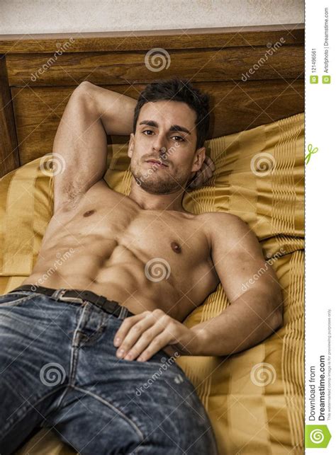 Shirtless Male Model Lying Alone On His Bed Stock Image Image Of Chest Blinds 121496561