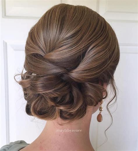 The trick to making an updo last on thick hair is breaking it up into a bunch of smaller, separate sections before pinning them in place. 60 Trendiest Updos for Medium Length Hair | Frisyrer ...