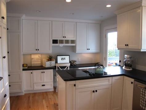White is a clean and calming color. BM Moonlight White painted cabinets | For My Nest ...