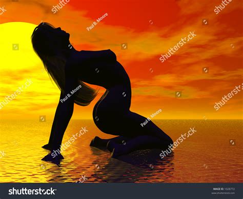 Arched Nude Silhouette At Sea And Sunset Slightly Highlighted Stock