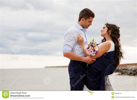 Loving Bride And Groom Standing On The Pier Stock Photo Image Of