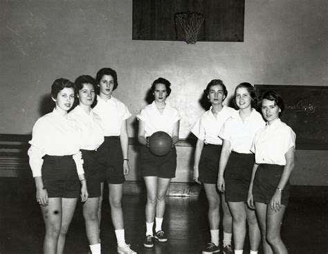 Basketball Team Posing In Old Gym 1950s · Sportssimmons