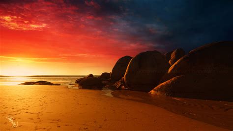 2560x1440 Beach Sand Sunset Sky Rock Wallpaper Coolwallpapersme