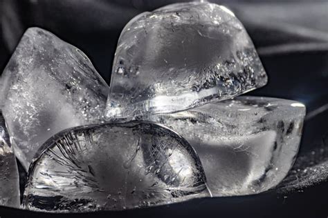 Four Ice Cubes Melting Stock Photo Image Of Crystallized 116387088