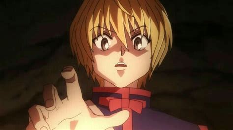 An Anime Character With Blonde Hair Pointing To The Side And Holding