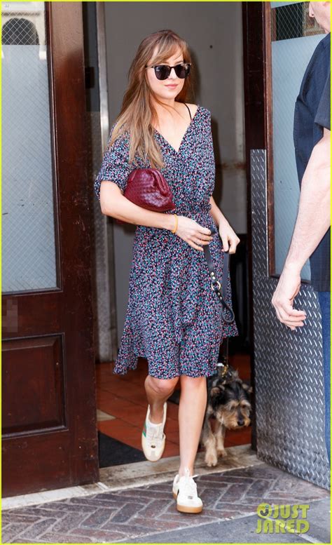 Dakota Johnson Dons Floral Dress While Taking Her Pup For A Stroll