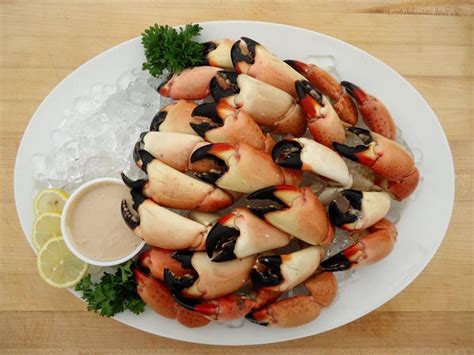 Using kitchen tongs, transfer the claws to a platter and serve with warm lemon butter sauce. Select Stone Crab Claws per pound - Keys Fisheries