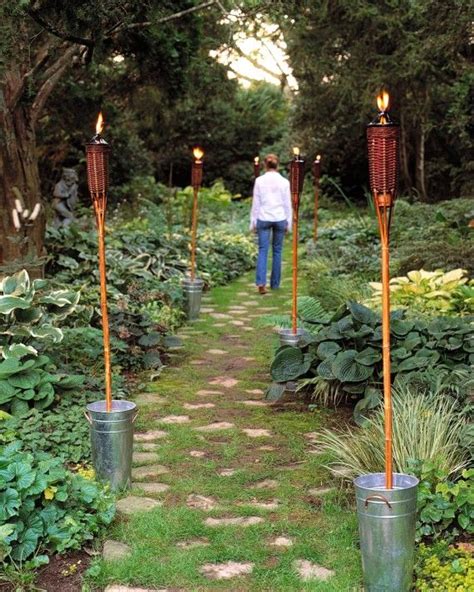 Decking Your Yard With Tiki Torches Is An Inexpensive Festive Way To