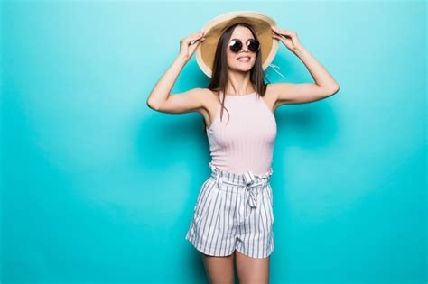 Free Photo Portrait Of Pretty Woman In Sunglasses And Hat Over Blue Colorful Wall Summer