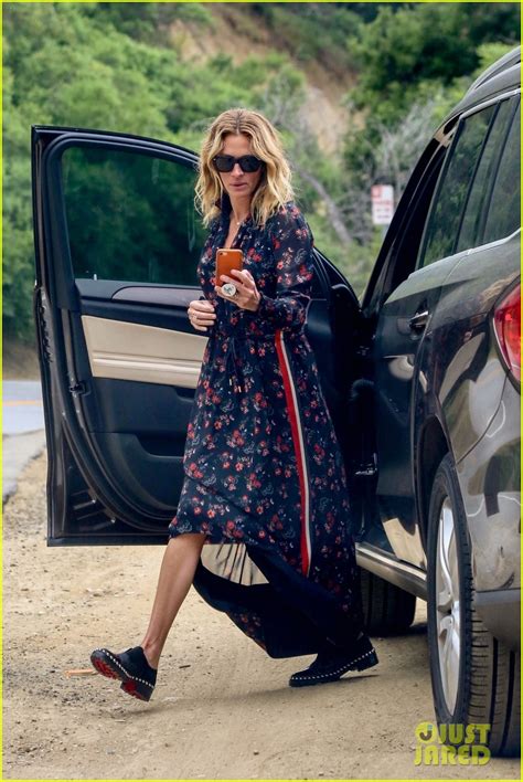 Julia Roberts Takes Pictures Of Photographers While Running Errands In