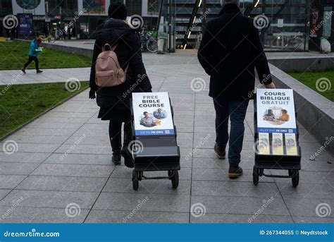 Portrait on Back View of Jehovah Witnesses Standing in the Street