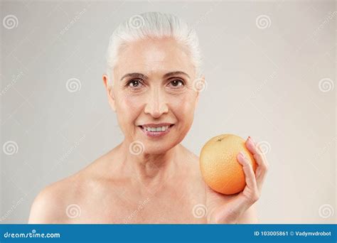 Beauty Portrait Of A Smiling Half Naked Elderly Woman Stock Image