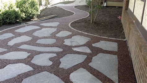 A concrete paver walkway with mexican pebble joints leads from the main house to the backyard art studio. Life Time Pavers: Gravel-Lok Pebbles Patio and Walkway | 1 ...