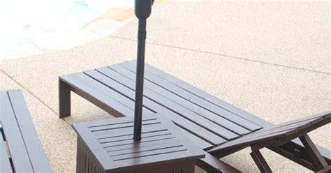 Look at your surroundings, and ask yourself whether you want your umbrella to blend in or pop out. DIY Outdoor Umbrella Stand and Loungers | Hometalk
