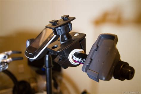 This is a phone mount for a bike that takes advantage of the common design used by magnetic car phone mounts. DIY: How I made a trainer bike computer/iPad/phone stand for $30 | DC Rainmaker