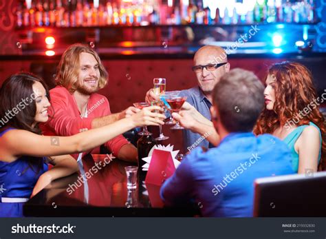Friendly People Toasting Alcoholic Drinks Party Stock Photo 219332830