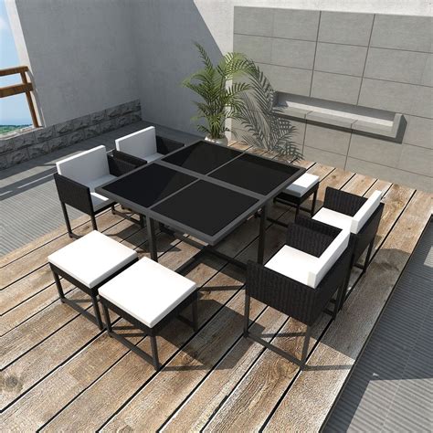 Sold by ami ventures inc. This 8-person rattan dining set has an elegant design and ...