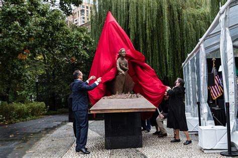 mother cabrini statue dedicated in battery park overlooks ellis island