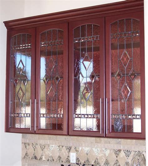 Clear, etched, textured and layered glass let you choose how much to hide or reveal. Cabinet Doors | Glass cabinet doors, Stained glass cabinets, Door glass design