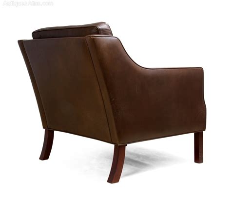 A pair of brown leather armchairs. Antiques Atlas - Danish Leather Armchair C 1960