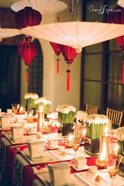 Create a holiday atmosphere characterized by warmth, joy, peace and prosperity. Chinese lanterns with candles on the table | Chinese new ...